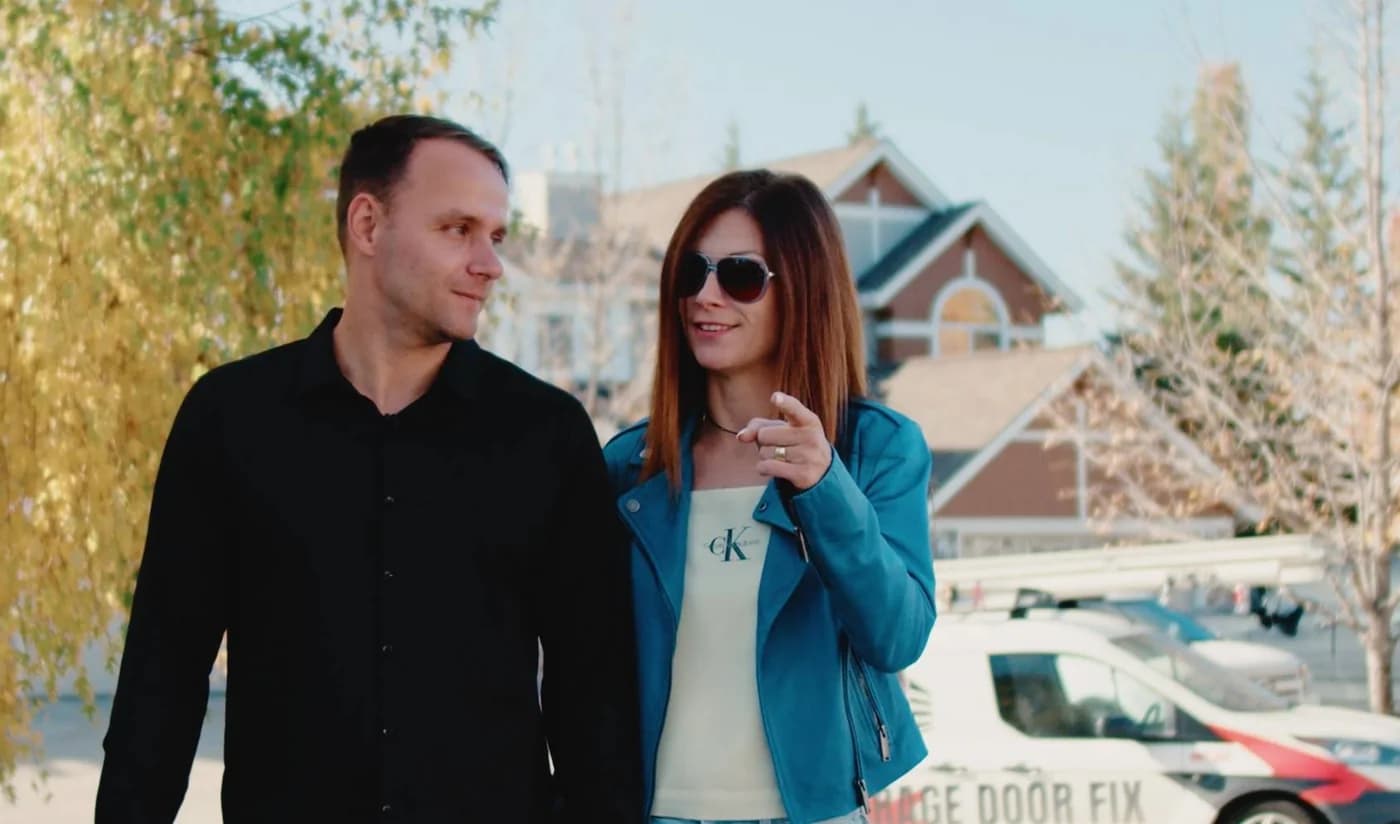 Stan and Marta standing together outdoors