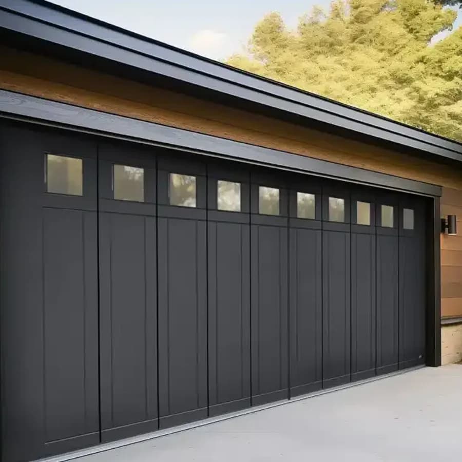 Side-sliding garage door panel sections turning the inside corner
