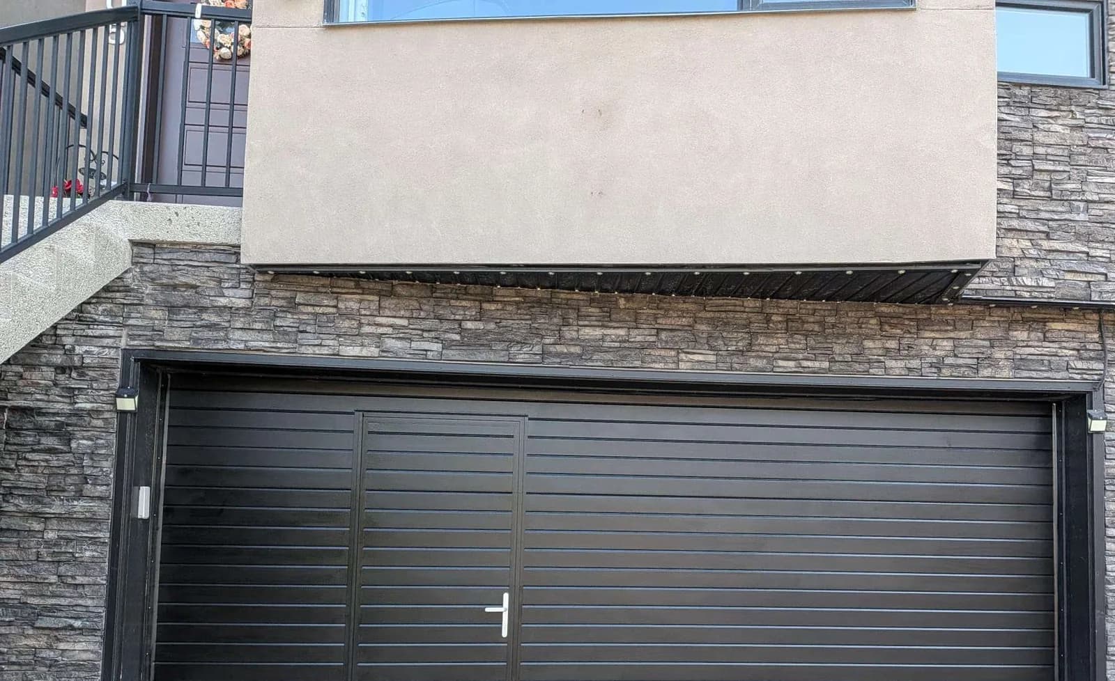 Downtown Calgary home with its main living level and exterior entrance one storey above the garage